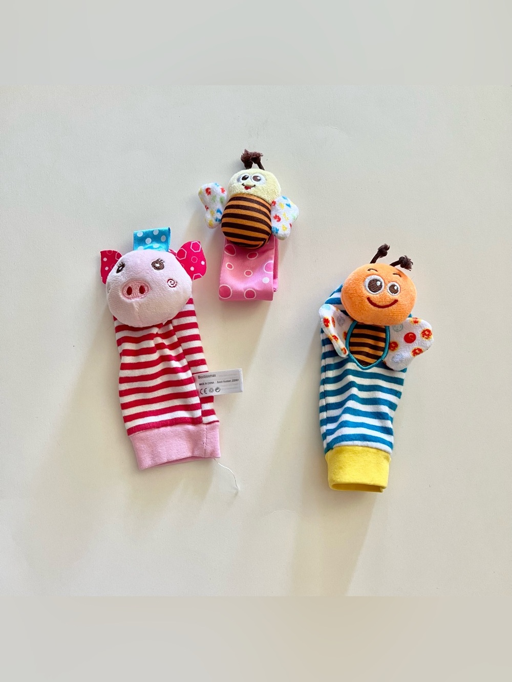 Bundle of rattle baby socks toys